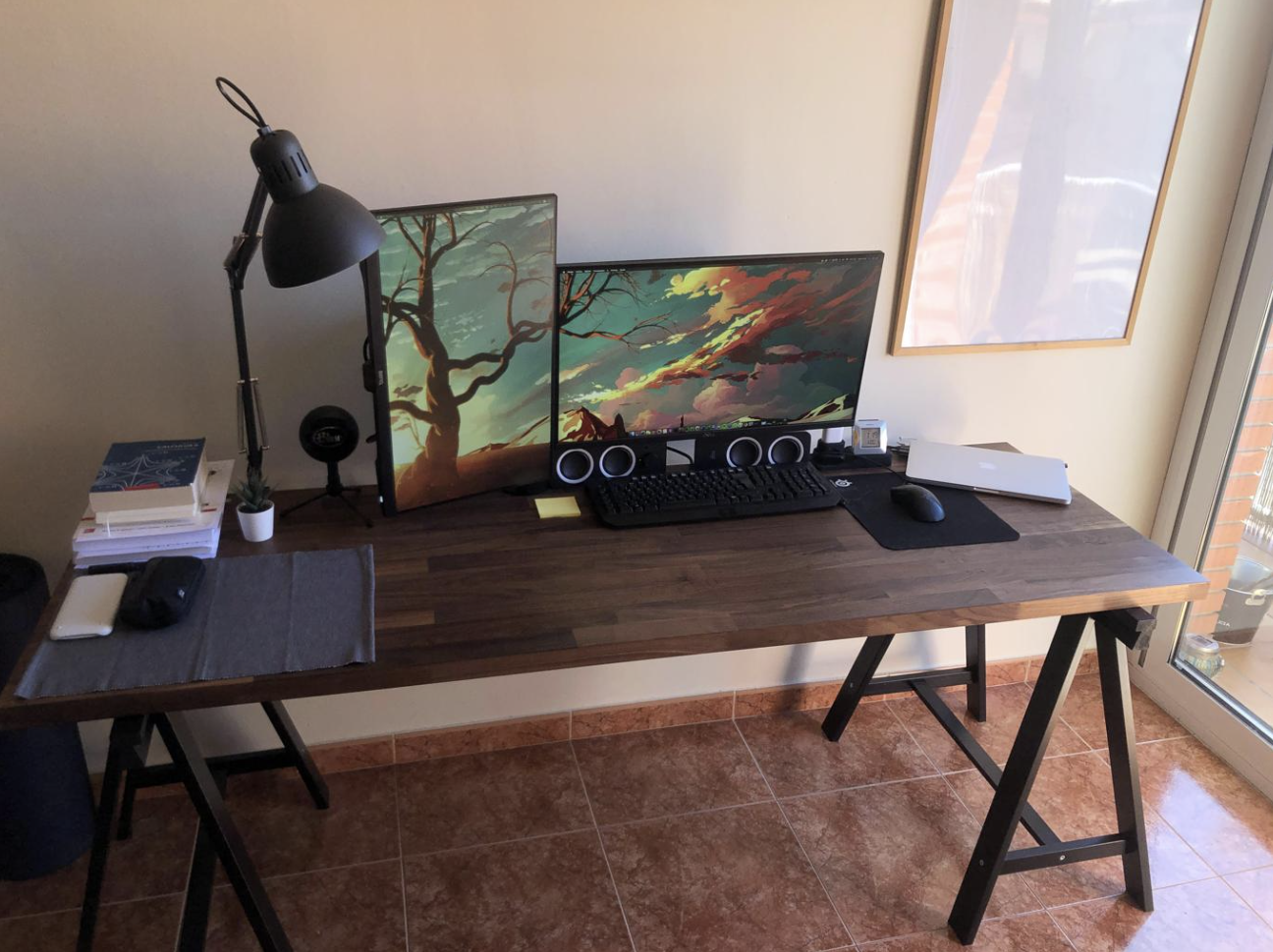 Organized work desk with a dual-monitor setup